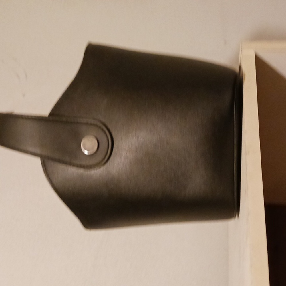 Black bucket purse. 8 x 8" with handle plus shoulder strap.